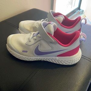 Nike revolution worn once!! Great condition. White, pink and purple. Easy Velcro